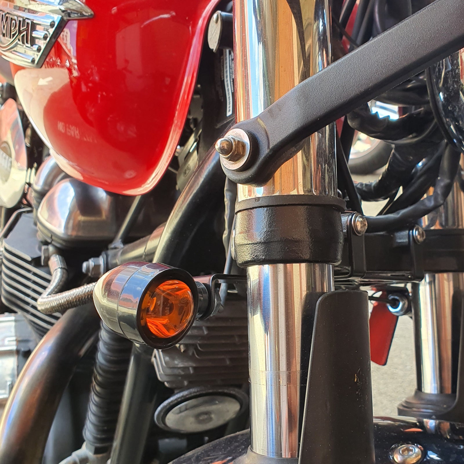 Triumph front indicators relocation bracket