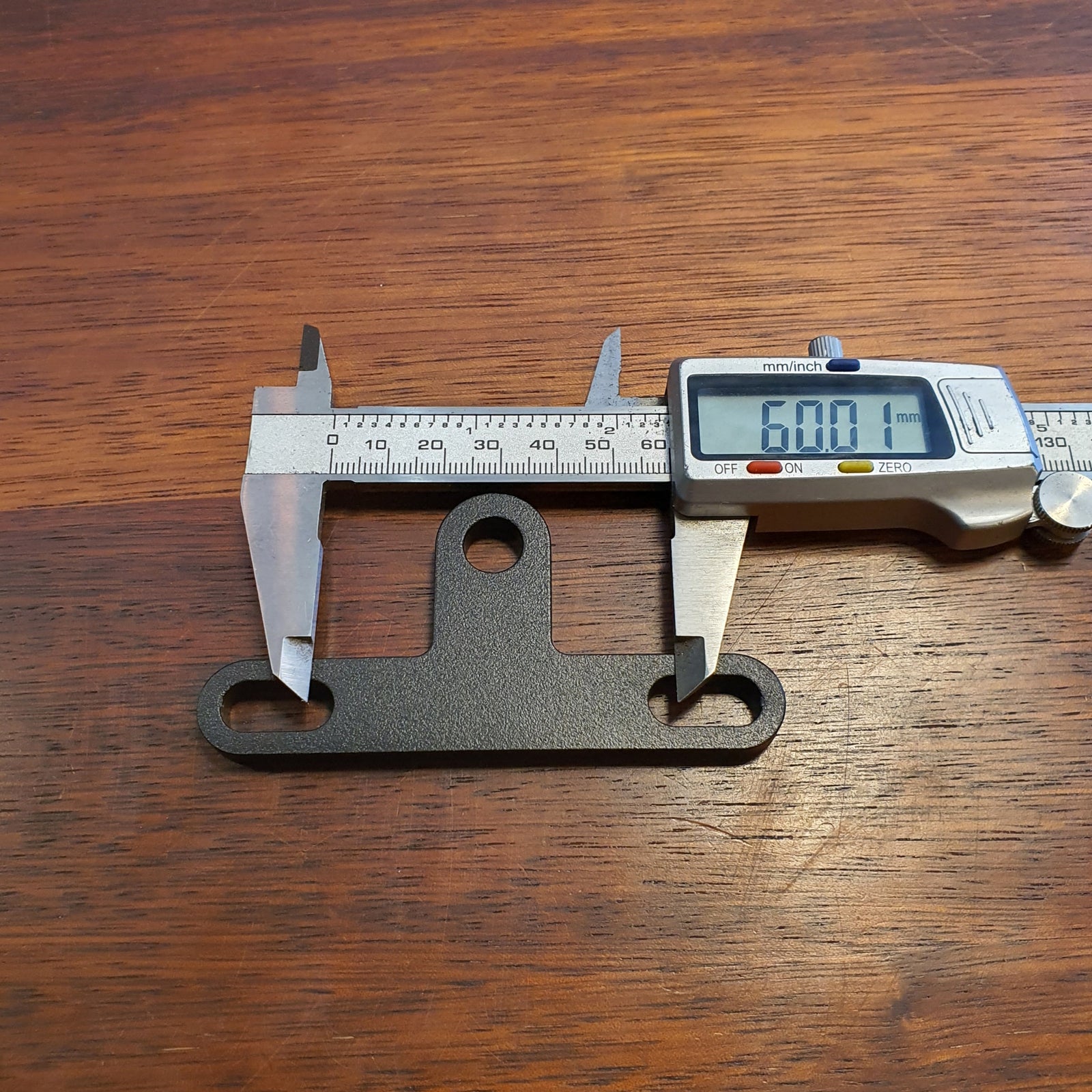 Universal headlight bracket bottom mount