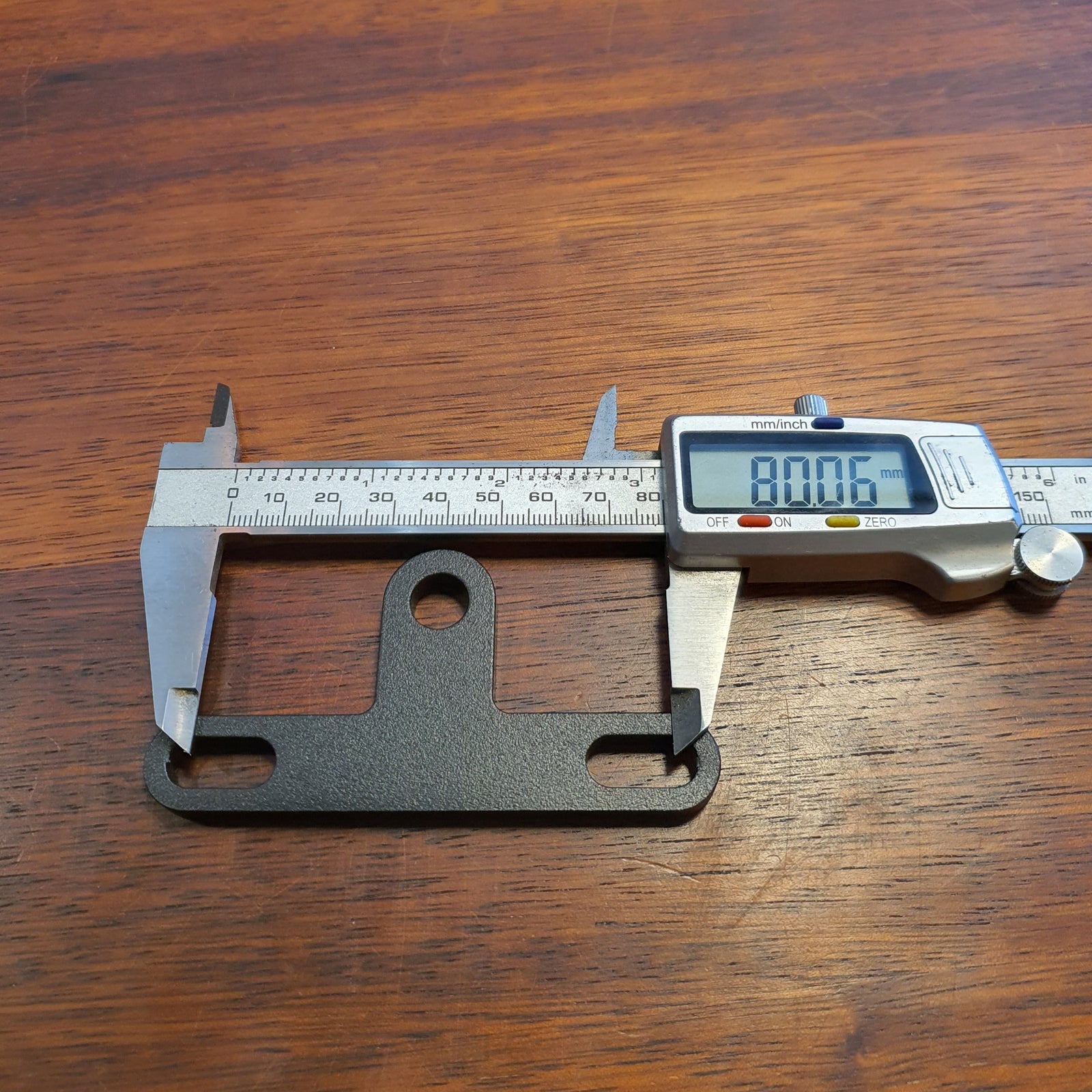 Universal headlight bracket bottom mount