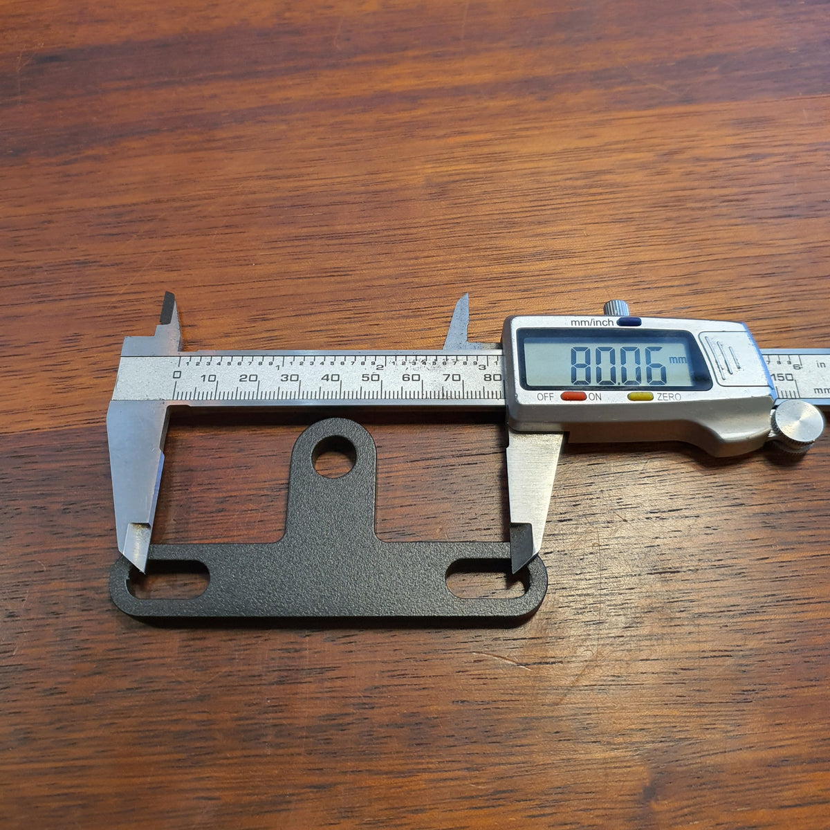 Universal headlight bracket bottom mount